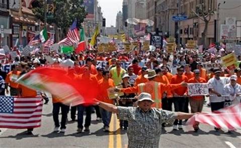 People fill Broadway during a march and rally for immigration ...