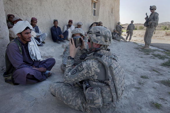 Sean Smith Afghanistan: American Army troops photograph and fingerprint villagers